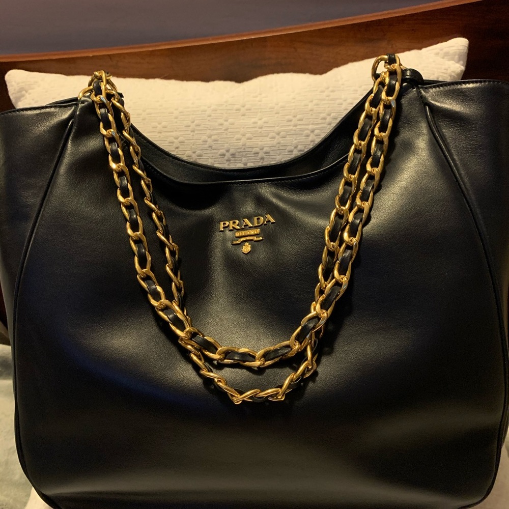 Prada bag. Navy Blue with gold strap.